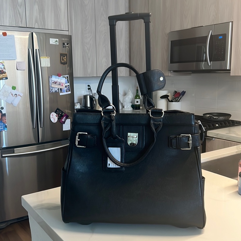 Hardly used Black Cabrelli Laptop Travel Roller Bag